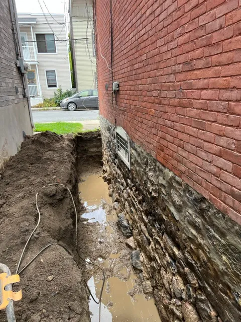 Solution for external foundation waterproofing in Saint-Laurent, QC. Before Solution for external foundation waterproofing in Saint-Laurent, QC. Before